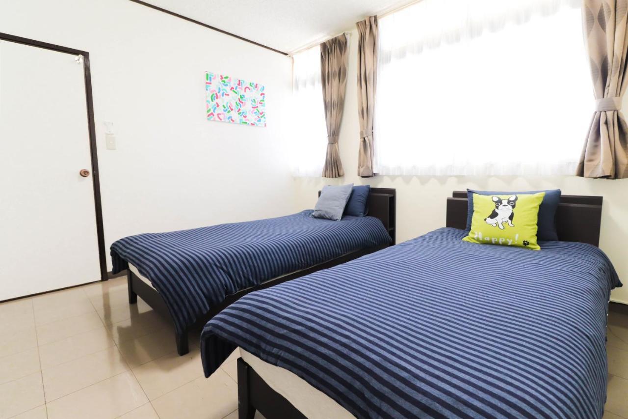 Condominium Hotel Mihama Upi Chatan Zewnętrze zdjęcie