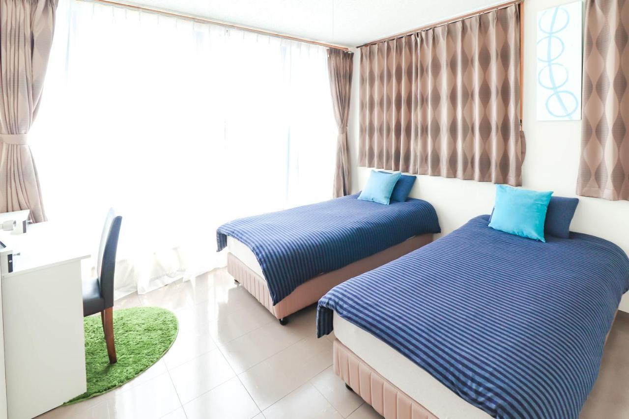 Condominium Hotel Mihama Upi Chatan Zewnętrze zdjęcie