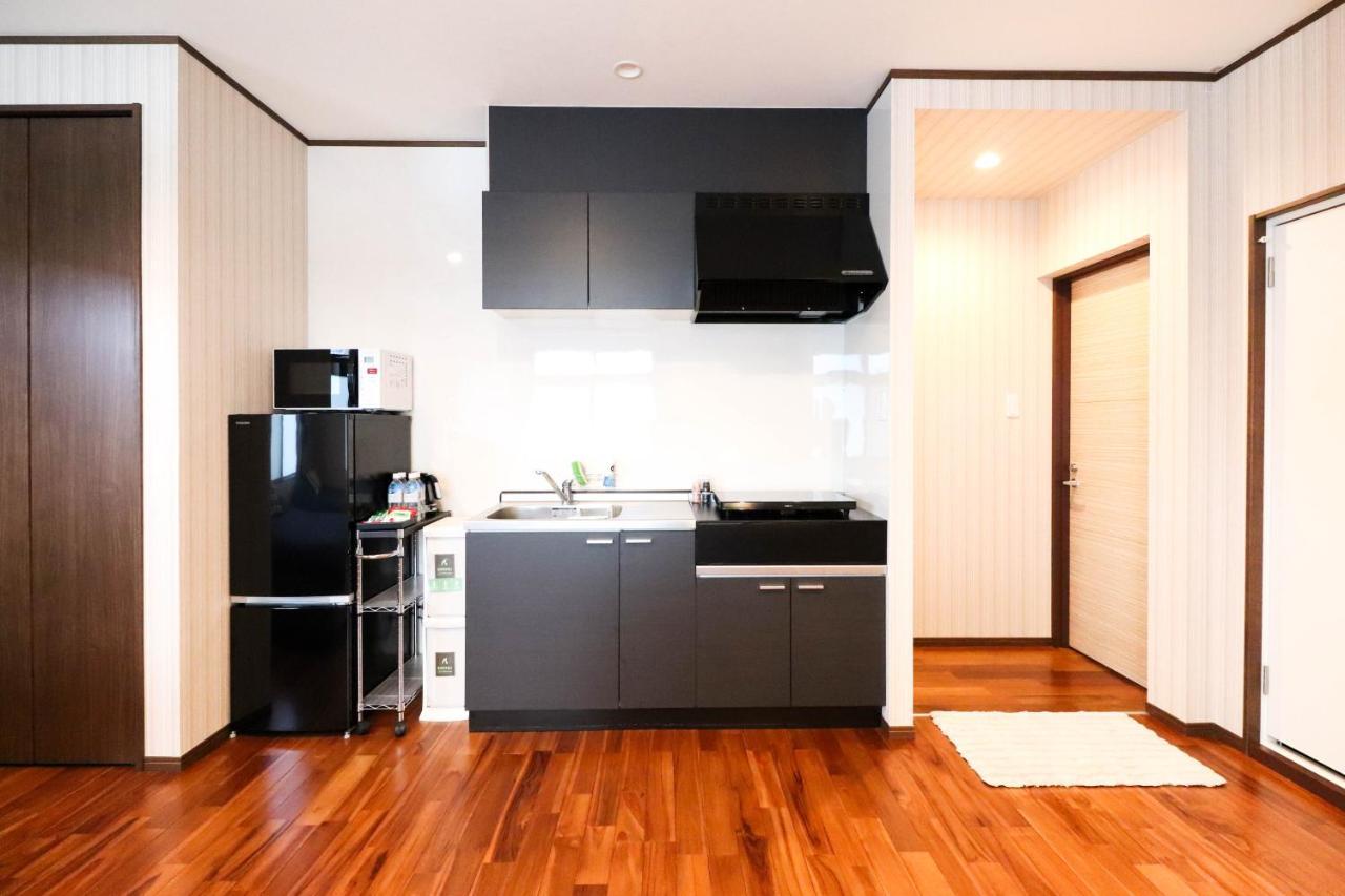 Condominium Hotel Mihama Upi Chatan Zewnętrze zdjęcie